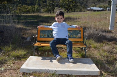Levi chilling on a little bench